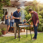 Costway Barbecue carbonella con griglia regolabile in altezza paravento laterali, Barbecue con gambe smontabili pinza per carbone - immagine 2