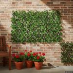 VESTIAMO CASA GIARDINO - Siepe Artificiale Estensibile con foglie di Schefflera Verde h28x280 cm - immagine 2